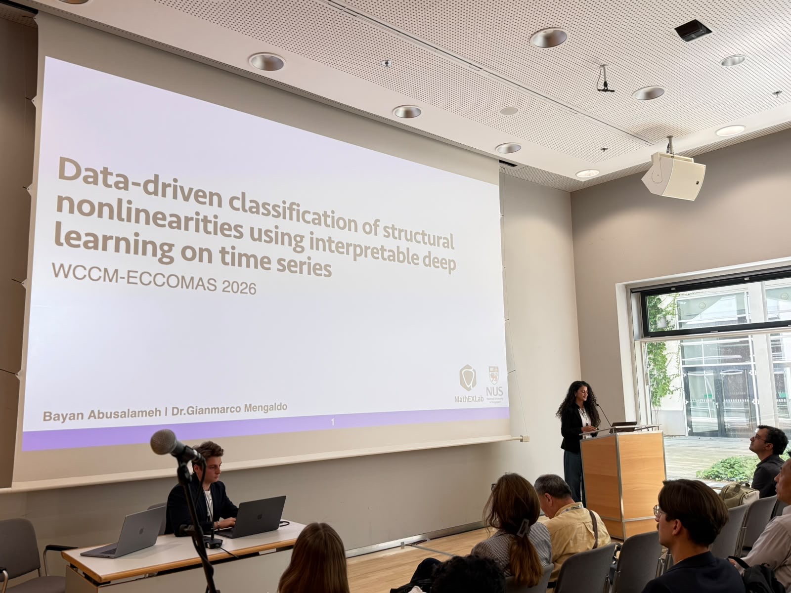 Bayan presenting — talk title slide